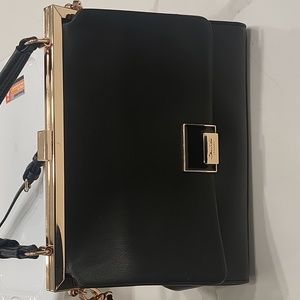 Gently used black leather handbag